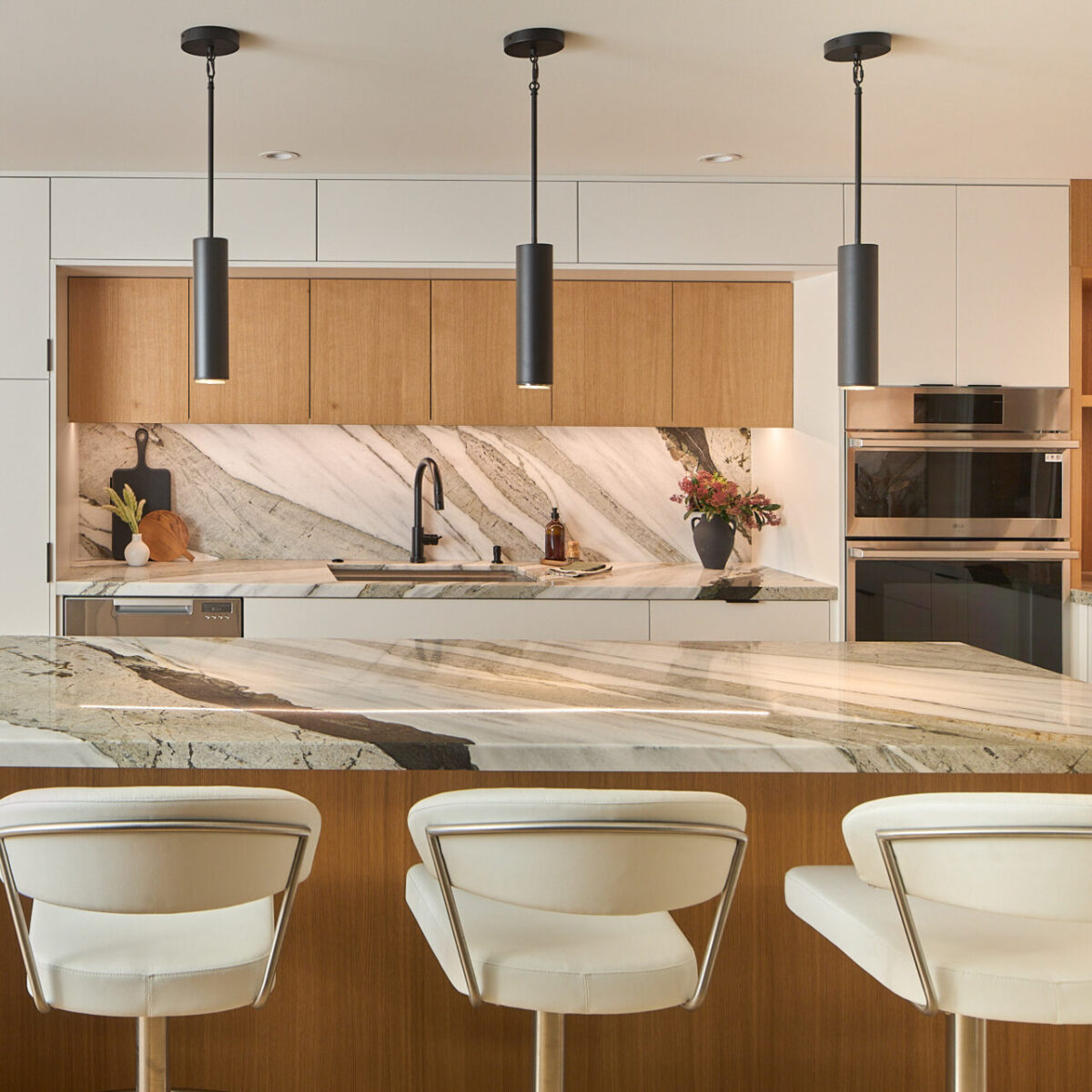 mkphoto-666leginboot-0374 Modern kitchen with wood cabinets and clean design