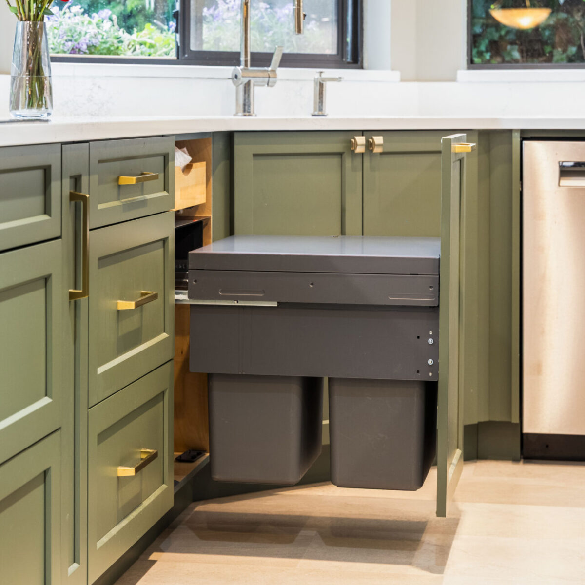 print_06x2 Modern kitchen with green cabinets and custom garbage pull-out